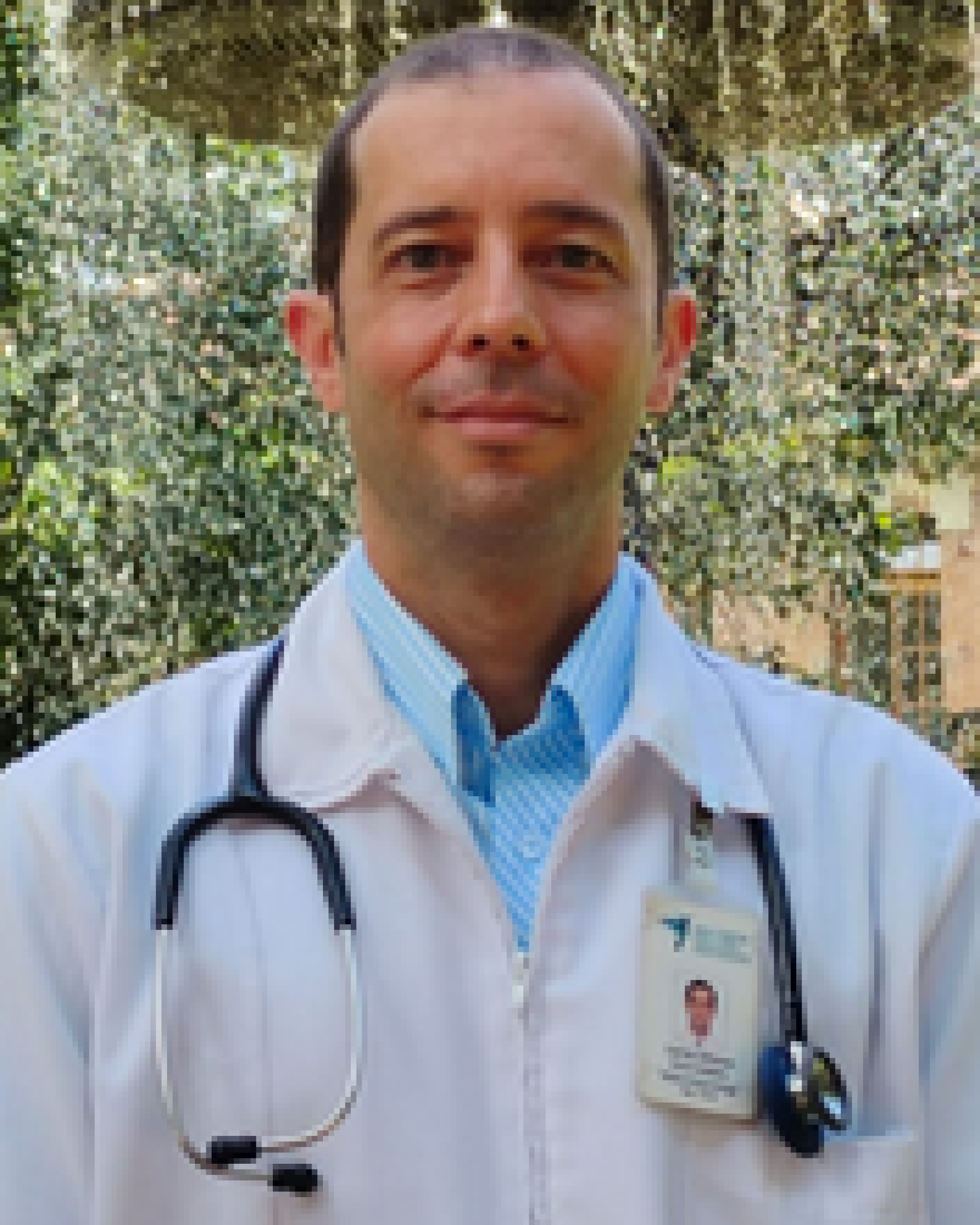 Dr. Carlos A. Builes